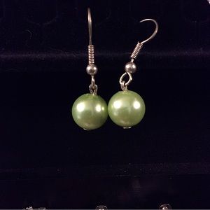 Sterling silver round green dangling earrings